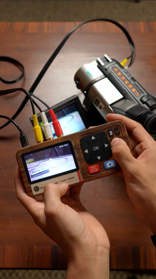 Vintage electronics reseller testing a VCR at a thrift store using the RVT Digitizer 3.0