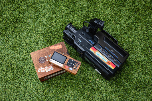 RVT Digitizer 3.0 VHS to digital converter with PAL and NTSC support next to a Magnavox VHS camcorder